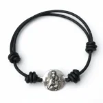 Pulsera de Virgen del Carmen plata calabrotes plata y cuero